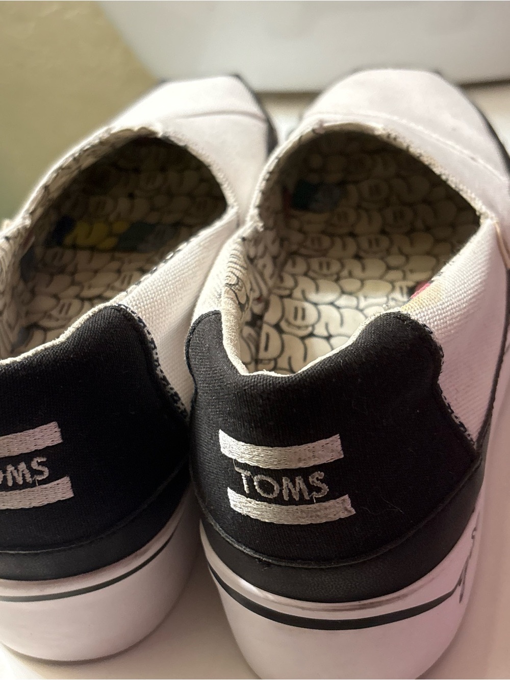 TOMS White Canvas Slip-On Shoes with Black Trim - Picture 6 of 7